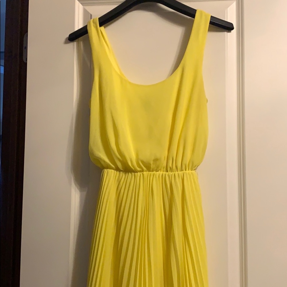 Yellow high- low Bebe dress